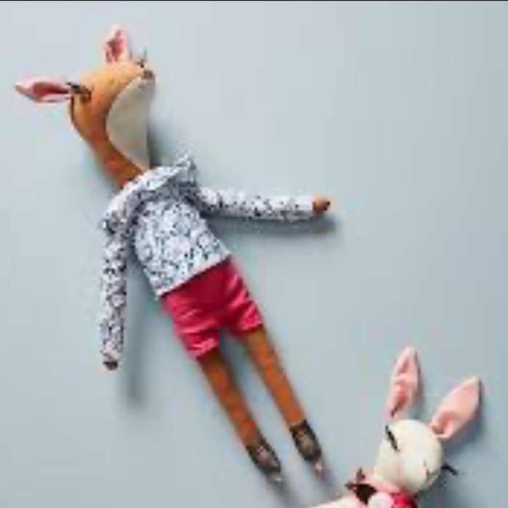 Anthropologie and Nina Bekh deer with roller skates plush doll. Great clothes.